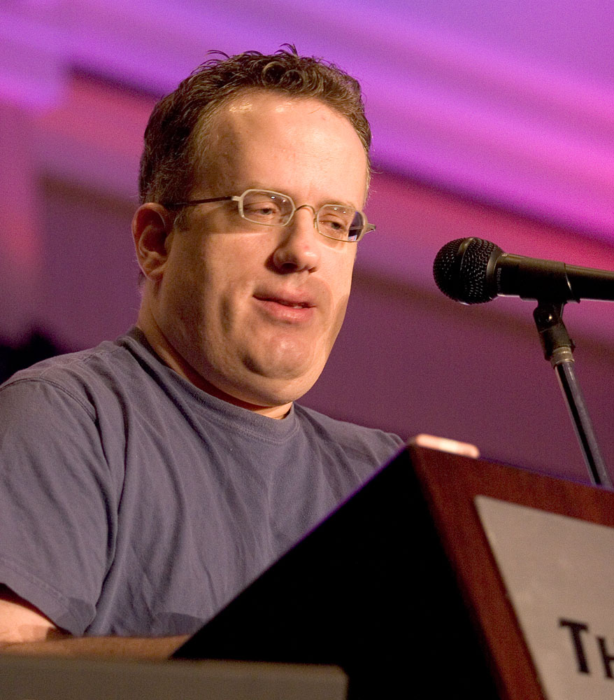 Eich at O'Reilly's ETech conference in 2005, in a T-shirt at a podium, at the height of the hacker era he thought would never end.