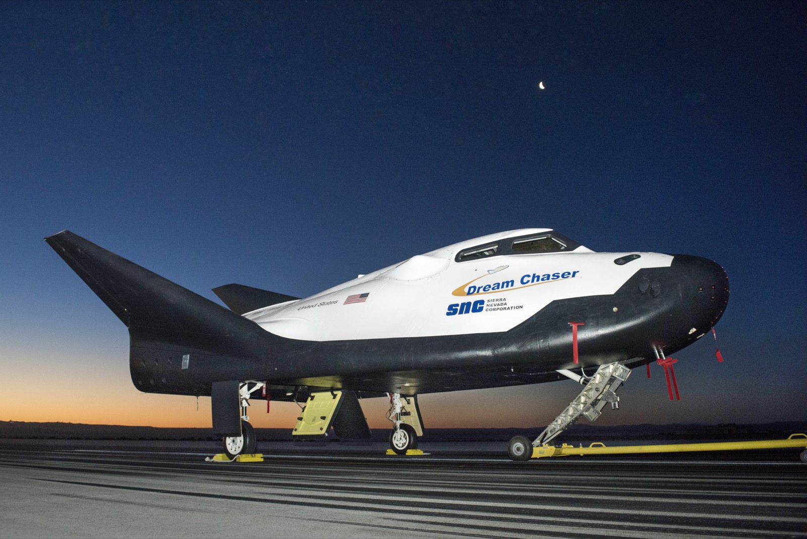 Sierra Space's Dream Chaser spaceplane on the runway at dawn