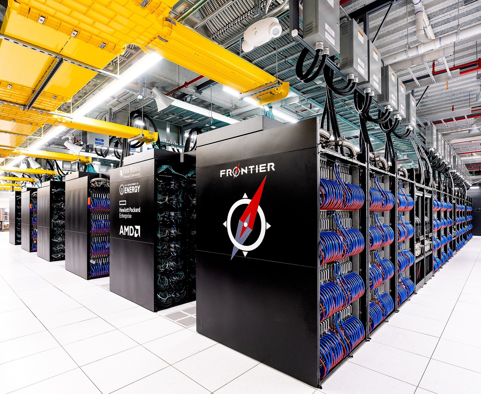 Rows of cabinets in the Frontier supercomputer at Oak Ridge National Laboratory