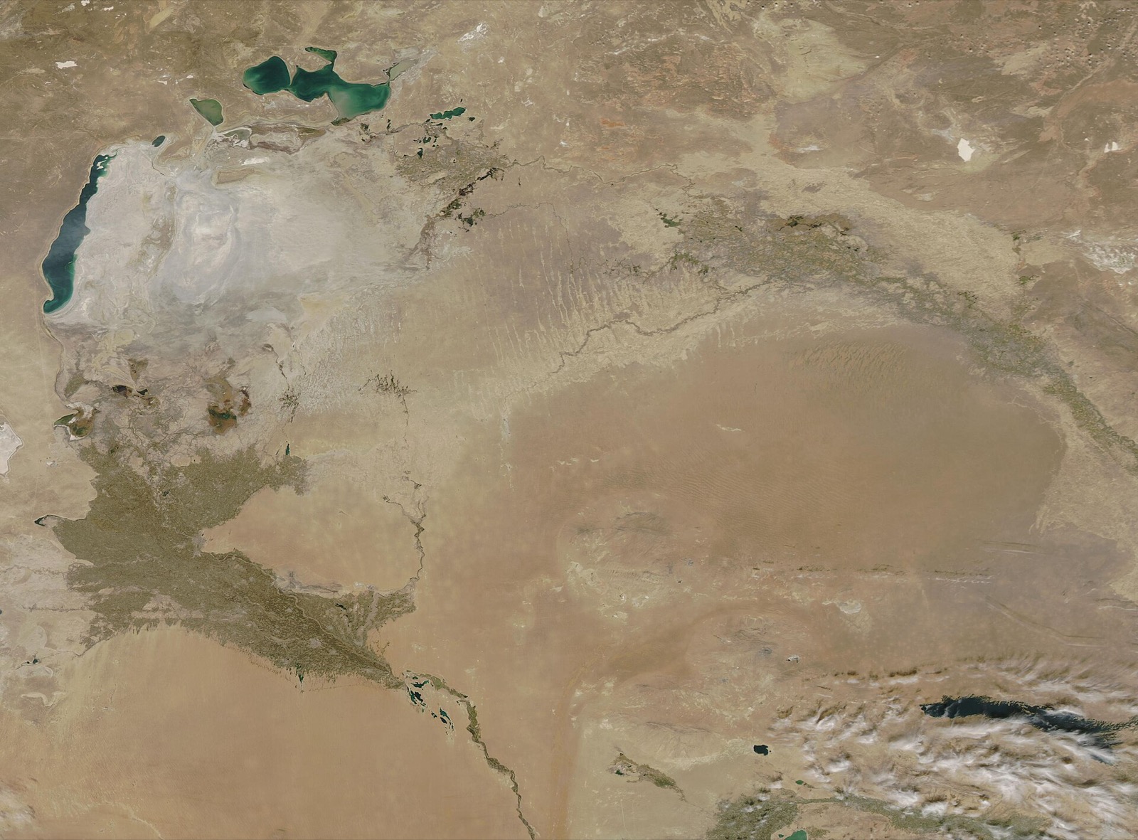 Sunlight over a vast arid landscape.