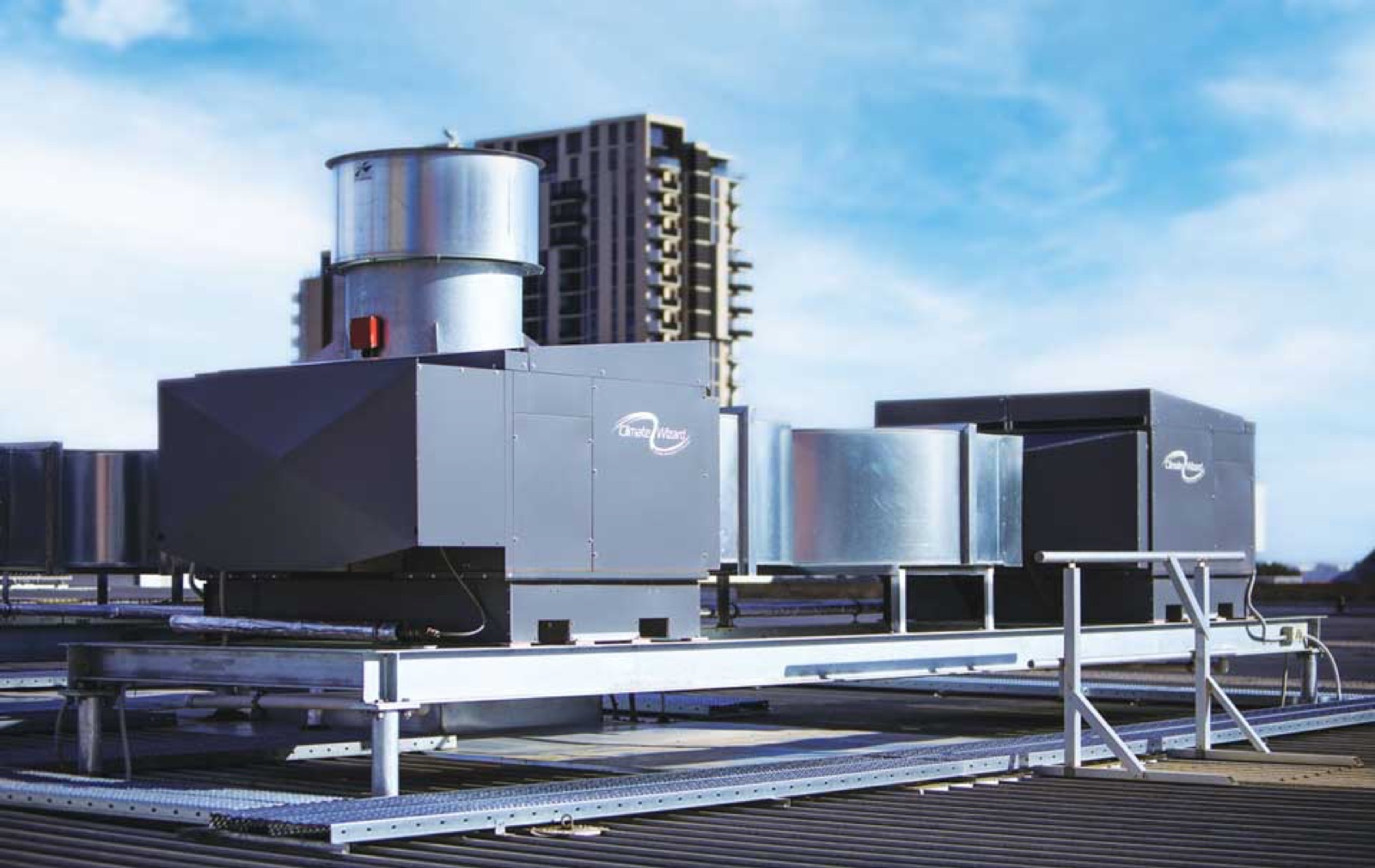 Seeley International's Climate Wizard indirect evaporative coolers installed on a commercial rooftop—refrigeration-grade cooling built on the Maisotsenko cycle, running on nothing but water.