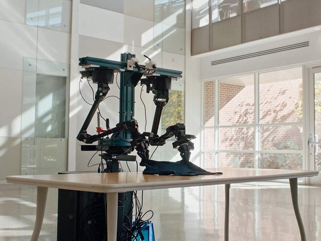 A bimanual research robot of the kind Meta's V-JEPA world model controls—the technology lineage Yann LeCun's AMI Labs is built on.