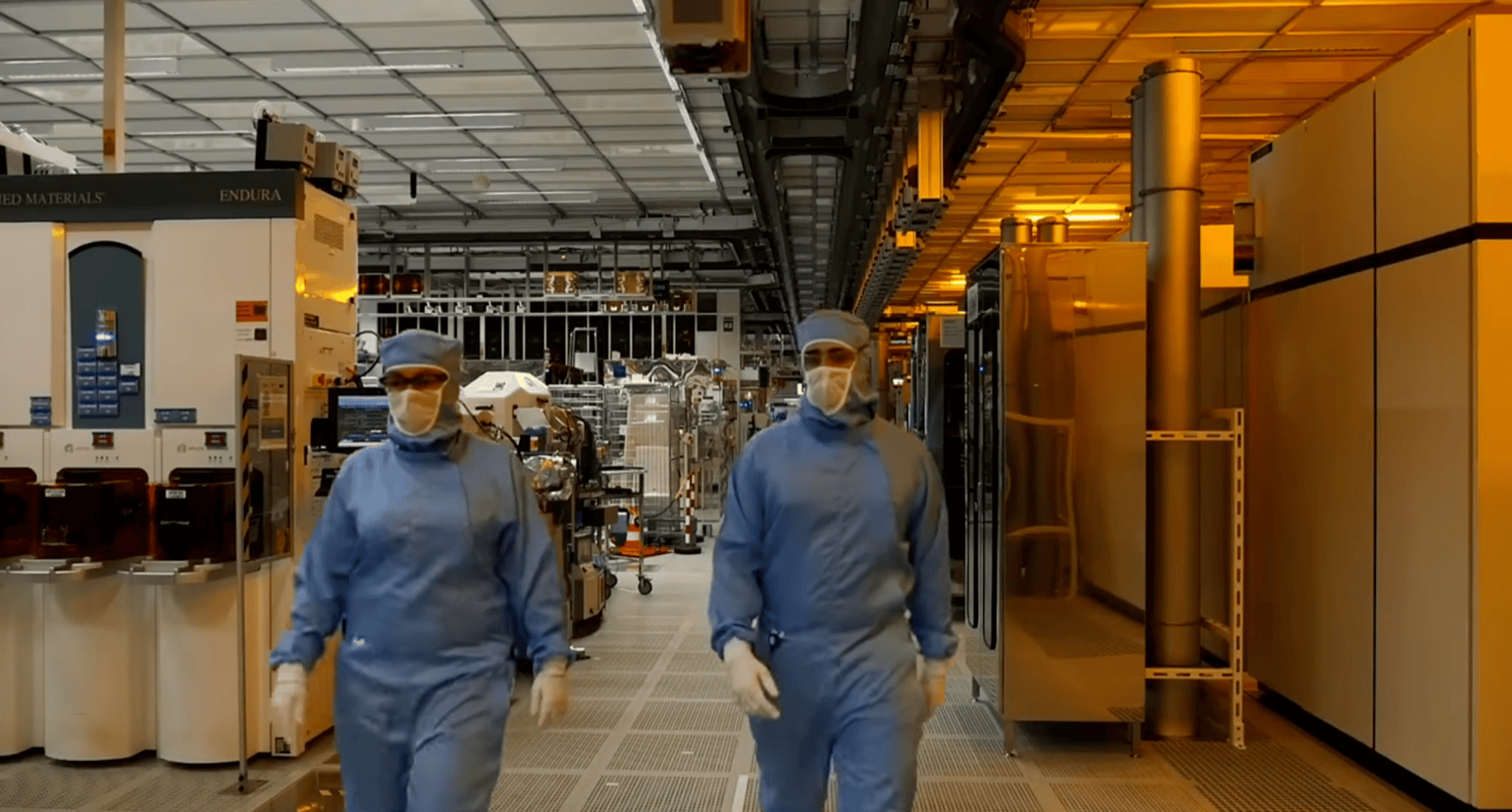 Inside a semiconductor cleanroom, where designs finally become physical silicon. Open software now reaches all the way to the foundry door.