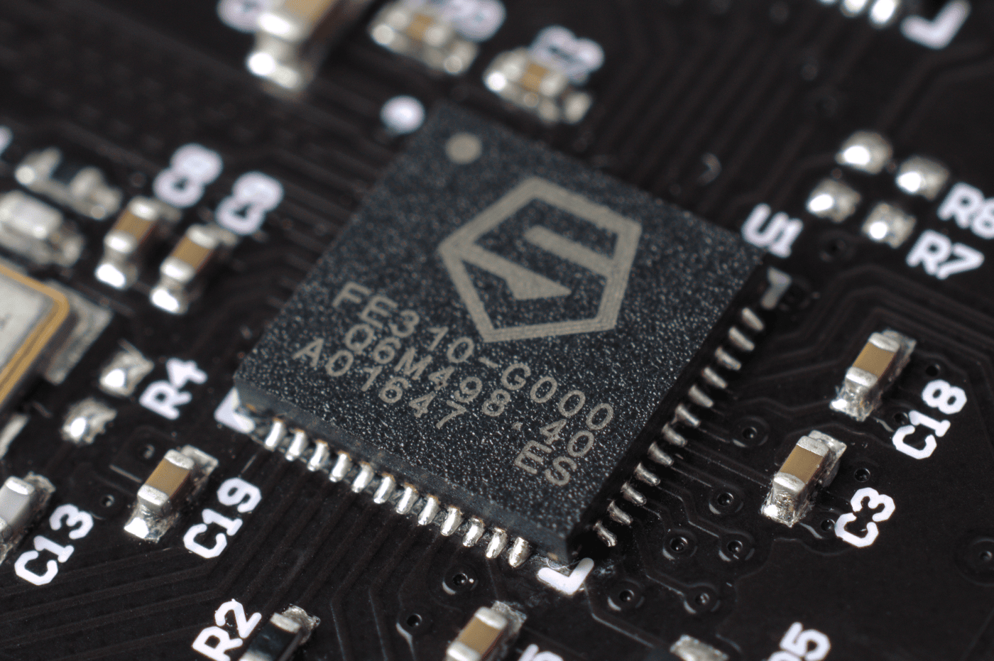 A SiFive FE310 RISC-V processor mounted on a HiFive development board — one of the first commercial chips built on the free, open RISC-V instruction set.