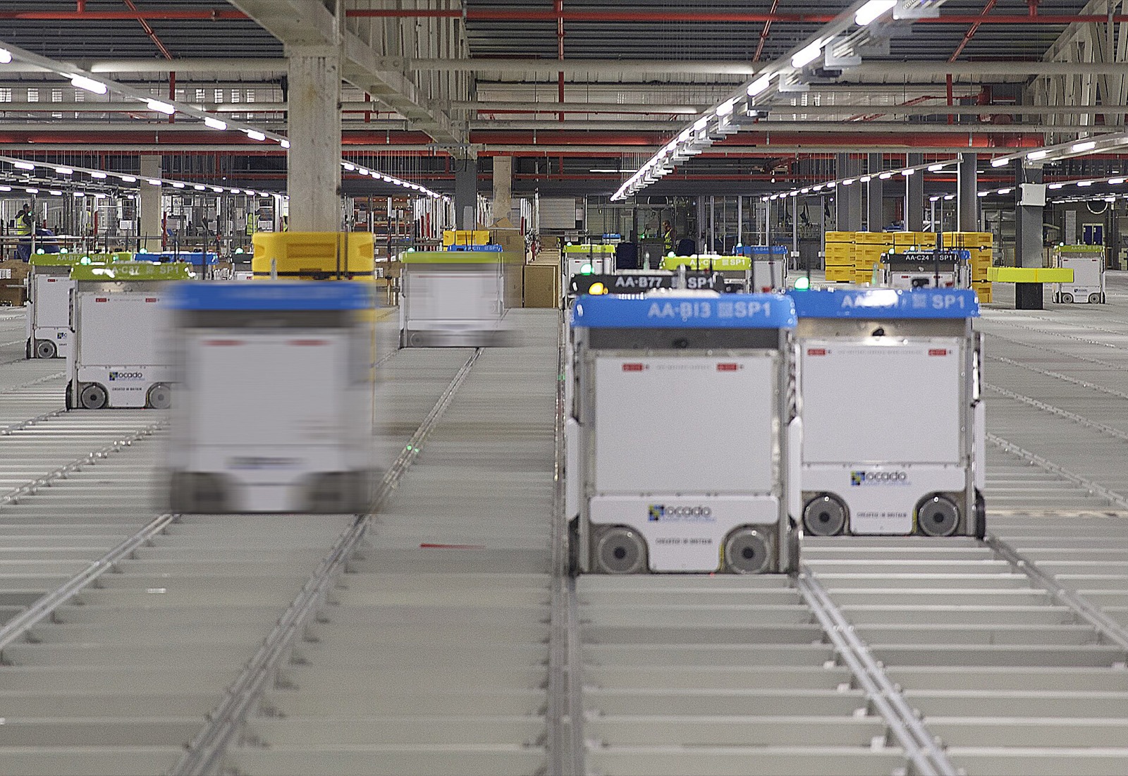 Autonomous grid robots in a highly structured warehouse. This is what winning looks like when form is allowed to follow function.
